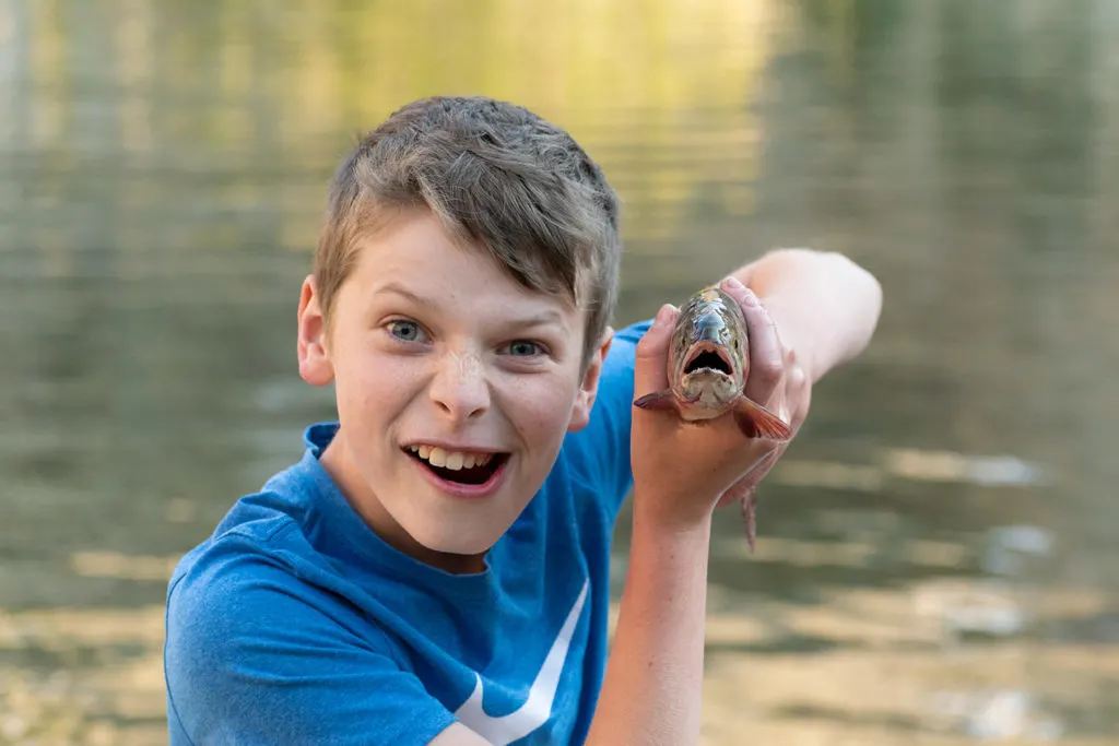 Boy with Fish in Colorado