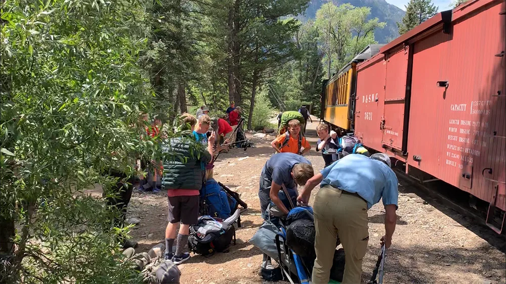 Getting off the train to Backpack to Camp